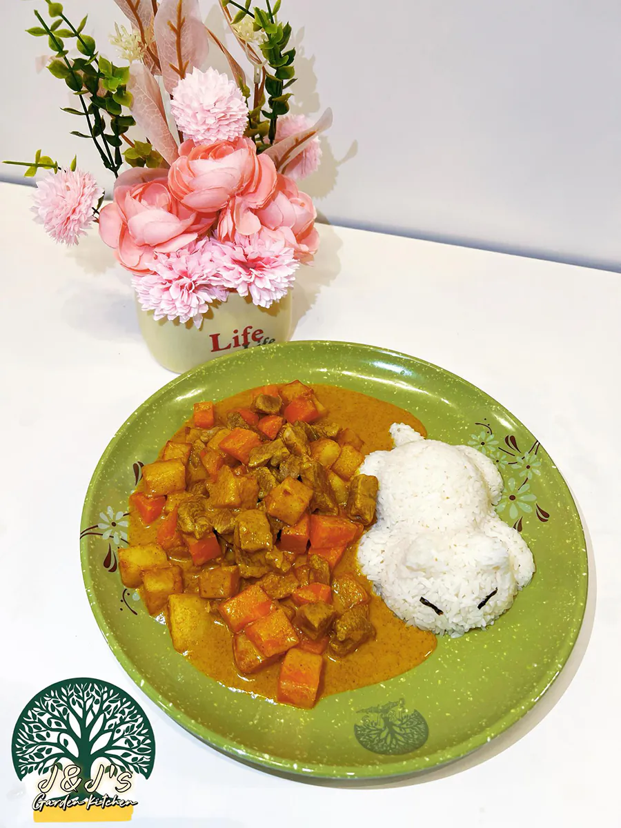 Japanese curry with rice shaped like a cute bear, served with carrots and potatoes at J&J's Garden Kitchen，a Asian Restaurant in Fredericksburg